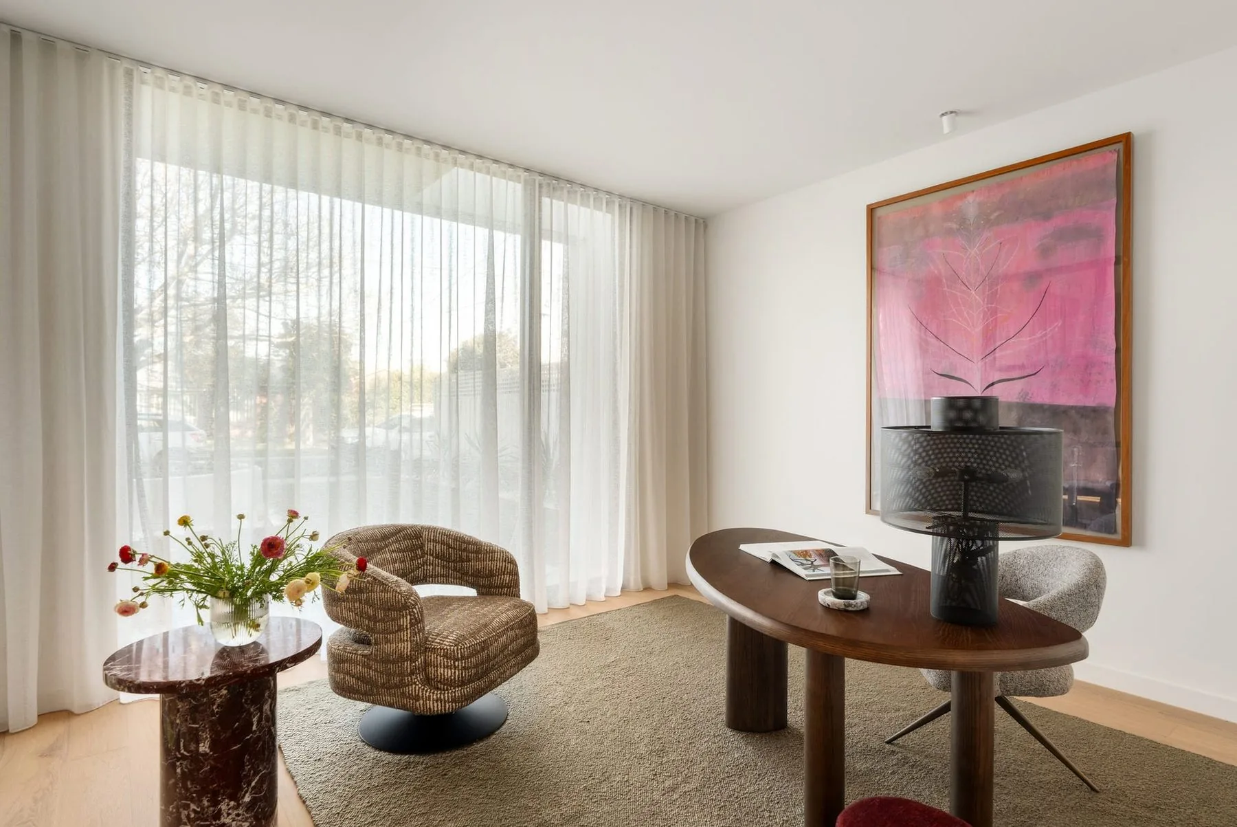 Study with floor to ceiling sheer curtains